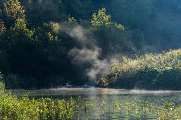 Morning mist above a lake at Plitvice Lakes National Park in Croatia